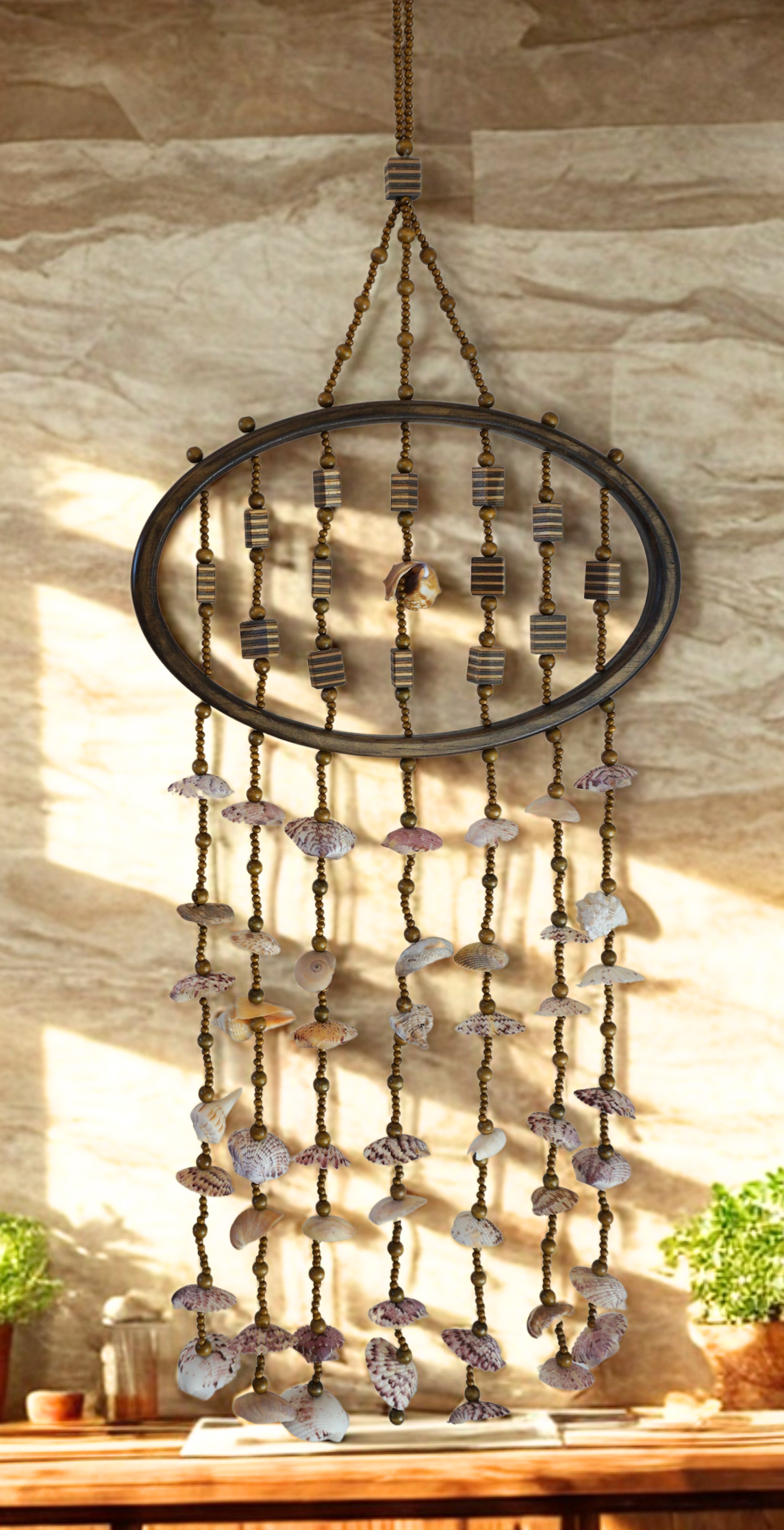 Decorative shell wall hanging against a wooden wall.