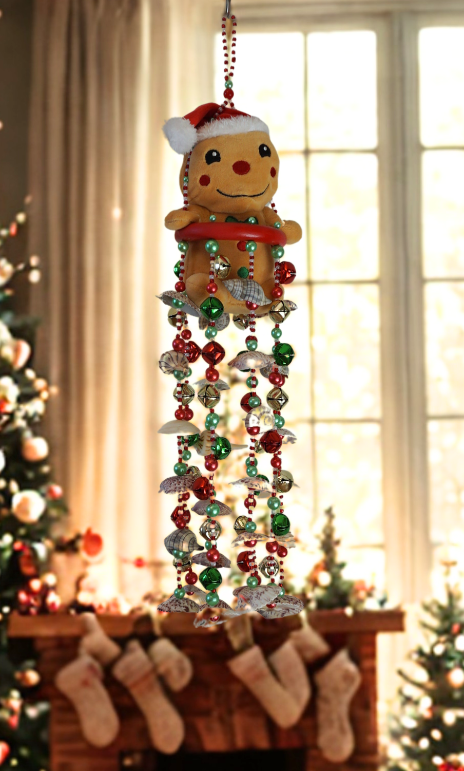 Decorative hanging gingerbread man wind chime with shells and beads in a festive setting.